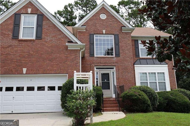 view of front of home with brick siding and a garage