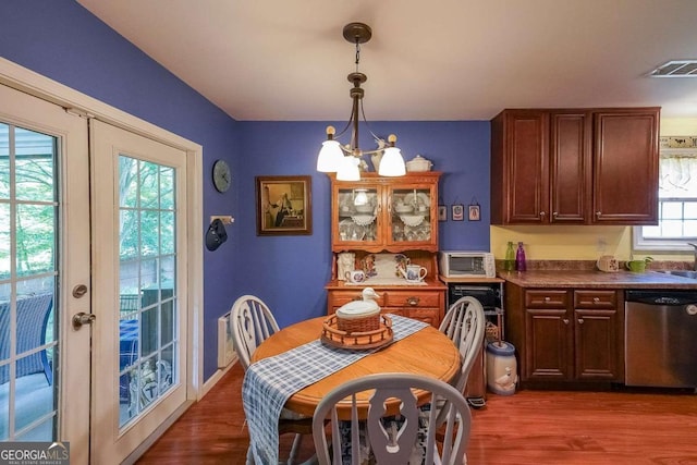 4872 Nature Trl, Austell, GA 30106 - dining room with a chandelier, wood finished floors, and french doors