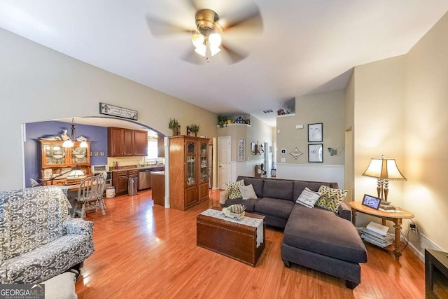 4872 Nature Trl, Austell, GA 30106 - living area featuring a ceiling fan, light wood-type flooring, and arched walkways