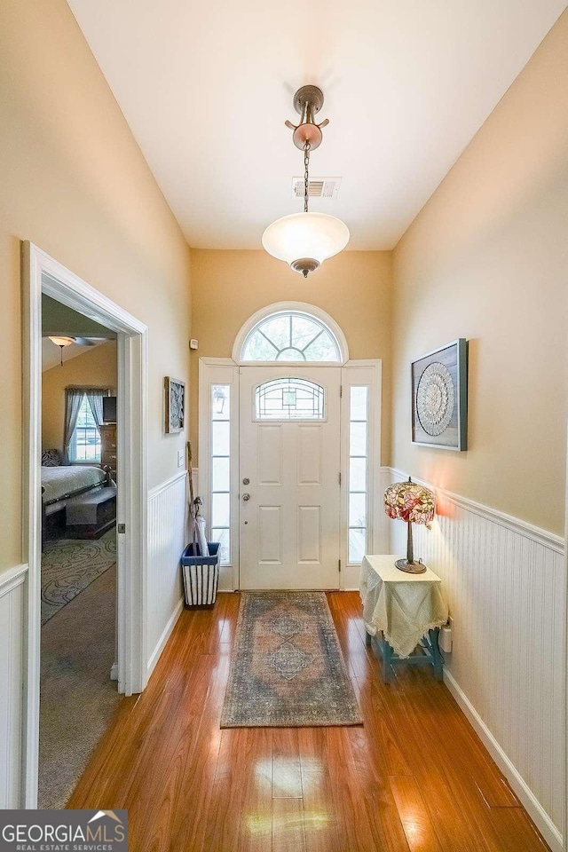 4872 Nature Trl, Austell, GA 30106 - foyer with wainscoting, wood finished floors, and plenty of natural light