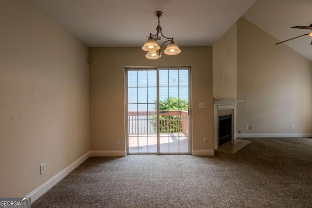 unfurnished living room with carpet flooring, baseboards, and a chandelier