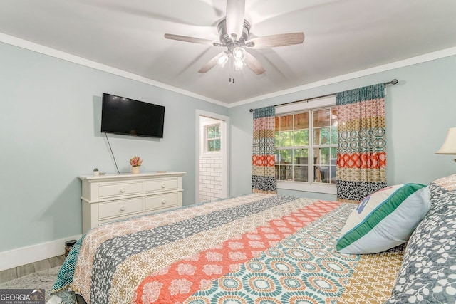 46 SW Colleen Karen Rd SW, Euharlee, GA 30120 - bedroom featuring wood finished floors, crown molding, baseboards, and ceiling fan
