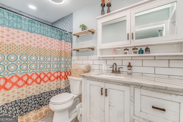 46 SW Colleen Karen Rd SW, Euharlee, GA 30120 - bathroom with toilet, backsplash, vanity, and a shower with curtain