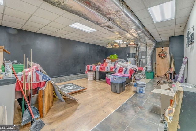 46 SW Colleen Karen Rd SW, Euharlee, GA 30120 - rec room with a drop ceiling, wood finished floors, and water heater
