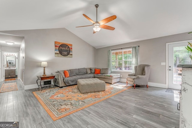 46 SW Colleen Karen Rd SW, Euharlee, GA 30120 - living room with ceiling fan, vaulted ceiling, wood finished floors, and baseboards