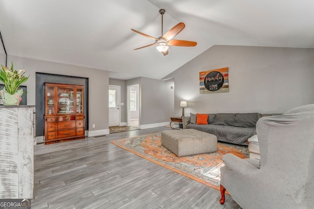 46 SW Colleen Karen Rd SW, Euharlee, GA 30120 - living area with a ceiling fan, wood finished floors, vaulted ceiling, and baseboards