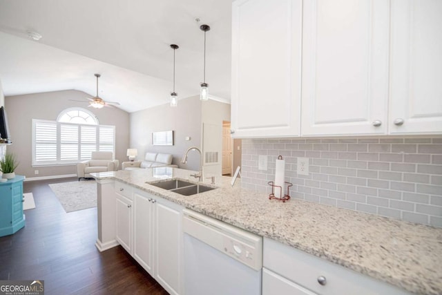 2114 Woodland Ln, Alpharetta, GA 30009 - kitchen with dishwasher, a sink, dark wood-style flooring, decorative backsplash, and ceiling fan