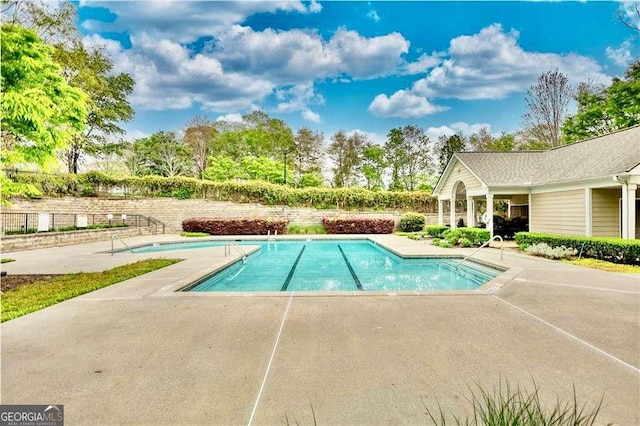 2114 Woodland Ln, Alpharetta, GA 30009 - community pool with a patio