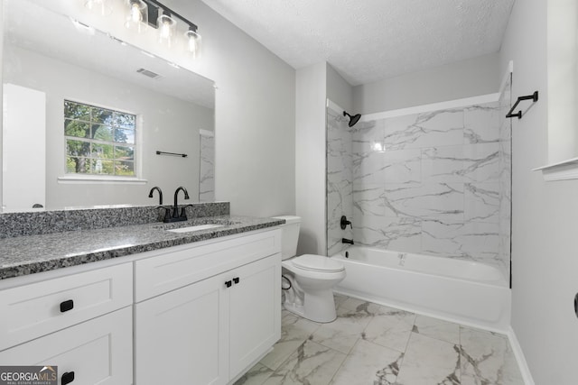 1404 Meadowind Ct SW, Conyers, GA 30094 - full bathroom featuring marble finish flooring, toilet, bathing tub / shower combination, vanity, and a textured ceiling