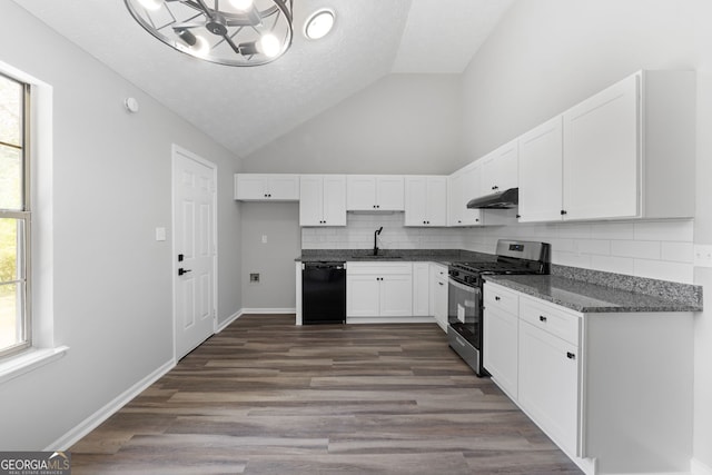 1404 Meadowind Ct SW, Conyers, GA 30094 - kitchen with stainless steel gas stove, black dishwasher, under cabinet range hood, a sink, and white cabinetry