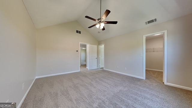 10961 Big Sky Dr, Hampton, GA 30228 - unfurnished bedroom featuring carpet flooring, a spacious closet, high vaulted ceiling, ceiling fan, and a closet