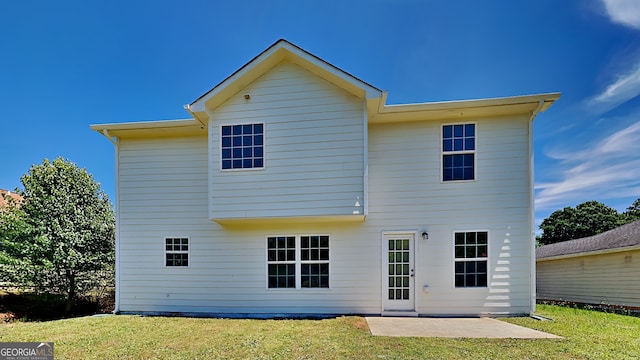 10961 Big Sky Dr, Hampton, GA 30228 - rear view of property with a patio and a yard