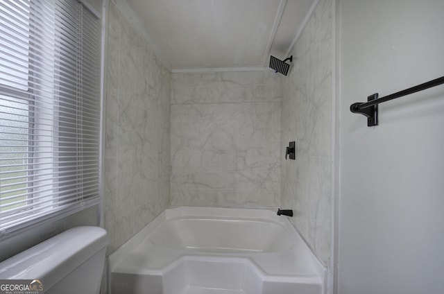 bathroom with crown molding and toilet