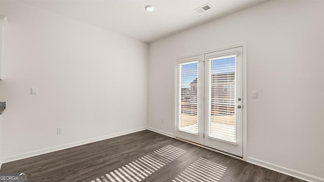 75 Poplar Blvd, Newnan, GA 30265 - empty room featuring dark wood-style floors and baseboards