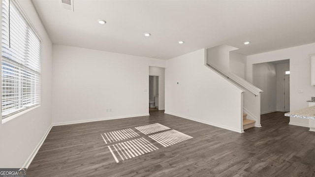 75 Poplar Blvd, Newnan, GA 30265 - spare room featuring plenty of natural light, stairs, dark wood-style flooring, and recessed lighting