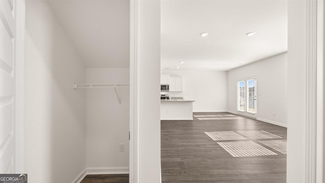 75 Poplar Blvd, Newnan, GA 30265 - walk in closet featuring dark wood-type flooring
