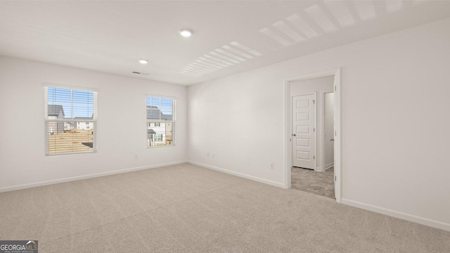 75 Poplar Blvd, Newnan, GA 30265 - unfurnished room with light carpet, baseboards, and recessed lighting