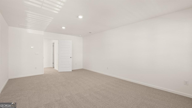 75 Poplar Blvd, Newnan, GA 30265 - unfurnished room featuring light carpet, baseboards, and recessed lighting