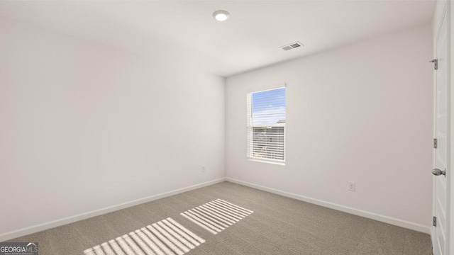 75 Poplar Blvd, Newnan, GA 30265 - spare room featuring light carpet and baseboards
