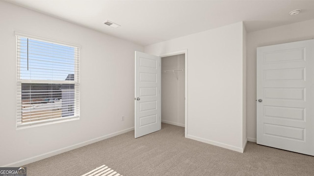 75 Poplar Blvd, Newnan, GA 30265 - unfurnished bedroom with carpet floors, baseboards, and a closet