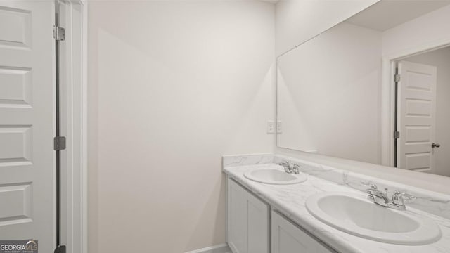 75 Poplar Blvd, Newnan, GA 30265 - bathroom with double vanity and baseboards