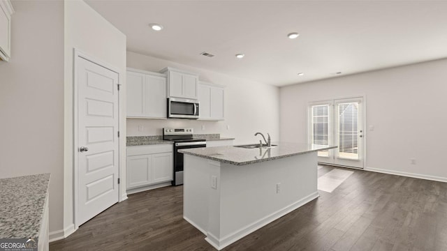 75 Poplar Blvd, Newnan, GA 30265 - kitchen featuring appliances with stainless steel finishes, a sink, dark wood-style floors, white cabinetry, and recessed lighting