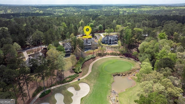 1111 Swift Crk, Greensboro, GA 30642 - aerial view of property and surrounding area with a heavily wooded area and a local golf course