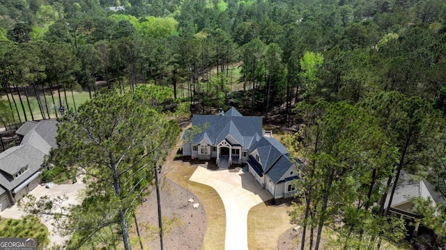 1111 Swift Crk, Greensboro, GA 30642 - aerial view of property and surrounding area featuring a heavily wooded area