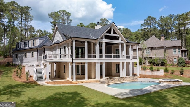 1111 Swift Crk, Greensboro, GA 30642 - back of house featuring a patio area, a lawn, stairs, ceiling fan, and a pool with connected hot tub