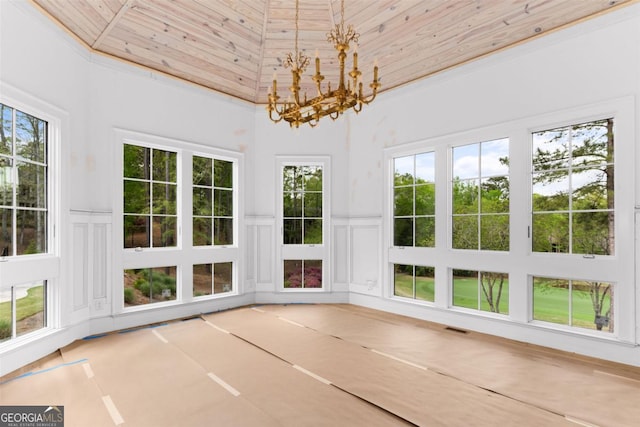 5010 Browns Ford Rd, Greensboro, GA 30642 - unfurnished sunroom featuring healthy amount of natural light and a chandelier