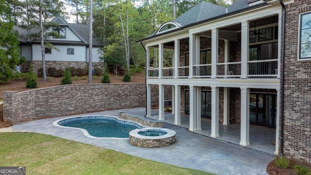 5010 Browns Ford Rd, Greensboro, GA 30642 - view of pool featuring a patio area, a sunroom, and a pool with connected hot tub