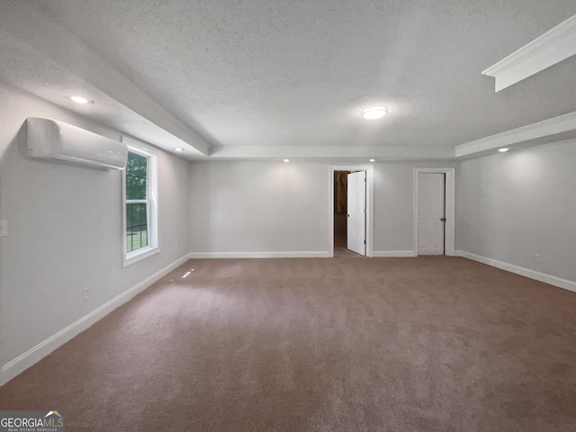 4335 Northwind Dr, Ellenwood, GA 30294 - carpeted spare room with a wall unit AC, a textured ceiling, baseboards, and recessed lighting