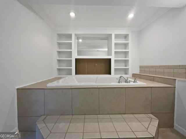 4335 Northwind Dr, Ellenwood, GA 30294 - bathroom featuring built in features, a garden tub, baseboards, and recessed lighting