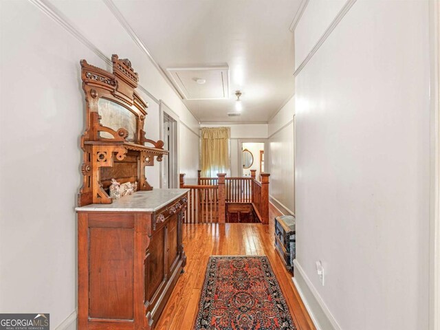 3021 Teamon Rd, Griffin, GA 30223 - corridor with an upstairs landing, attic access, and light wood-type flooring