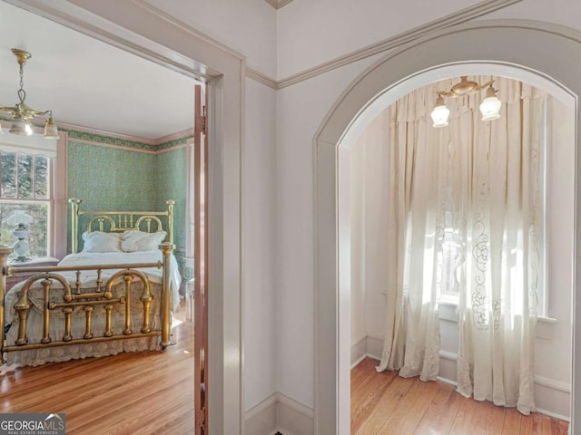 3021 Teamon Rd, Griffin, GA 30223 - foyer entrance featuring arched walkways, wood-type flooring, and baseboards