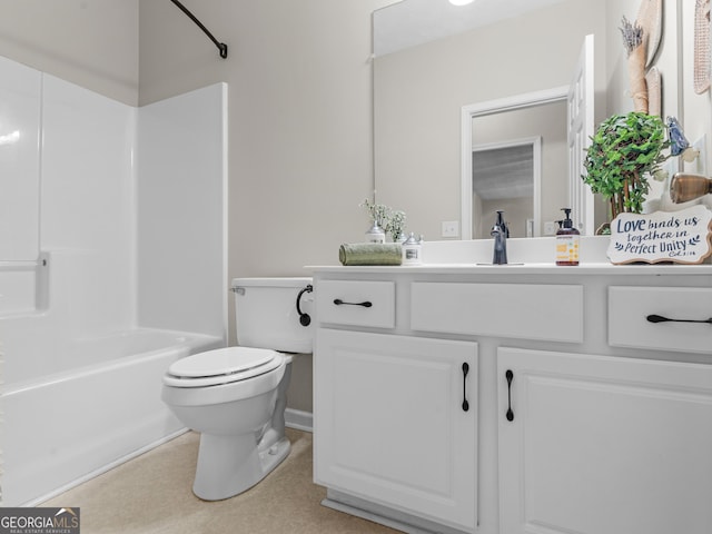bathroom with toilet, vanity, and shower / washtub combination