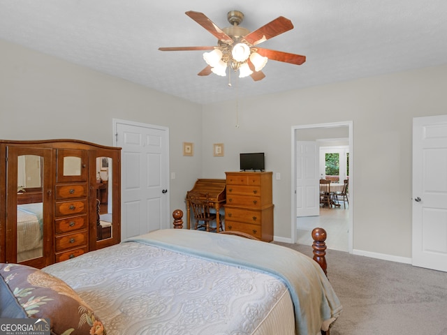 175 N Unity Grove Rd, Locust Grove, GA 30248 - bedroom featuring carpet floors, baseboards, and a ceiling fan