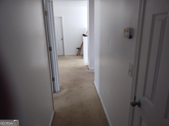 11950 Markham Way, Hampton, GA 30228 - corridor featuring light colored carpet and an upstairs landing