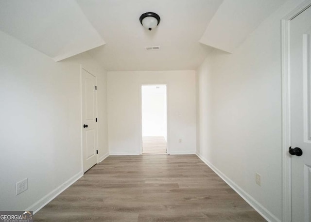 21 Whitegrass Way, Grayson, GA 30017 - empty room featuring wood finished floors and baseboards