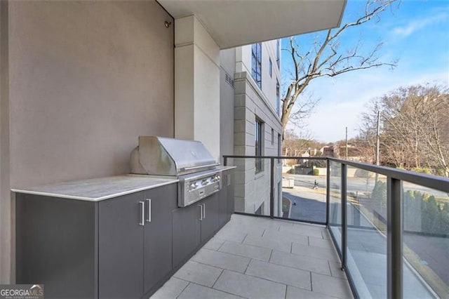 balcony featuring grilling area and exterior kitchen