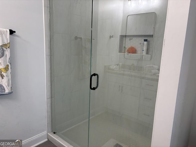 633 E 3rd St, Rome, GA 30161 - bathroom featuring a shower stall and baseboards