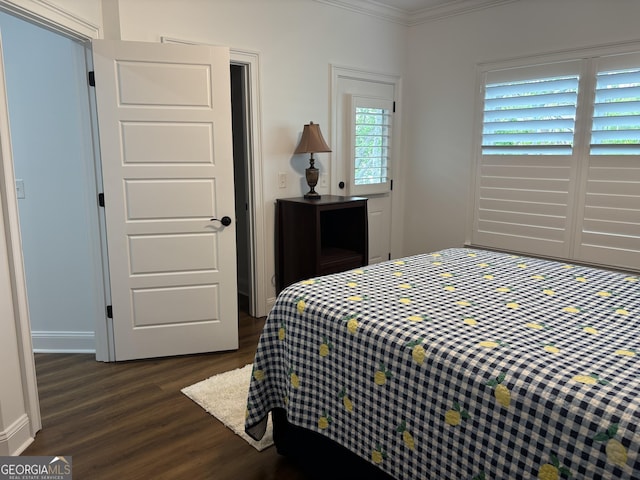 633 E 3rd St, Rome, GA 30161 - bedroom with dark wood finished floors, ornamental molding, and baseboards
