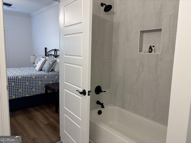 633 E 3rd St, Rome, GA 30161 - bathroom featuring crown molding, wood finished floors, and washtub / shower combination
