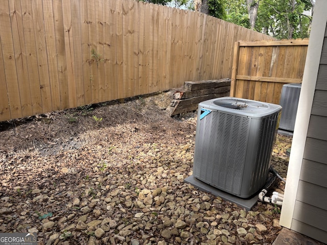 633 E 3rd St, Rome, GA 30161 - exterior view of central air condition unit and fence