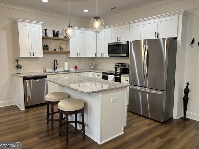 633 E 3rd St, Rome, GA 30161 - kitchen with stainless steel appliances, a sink, baseboards, open shelves, and white cabinetry