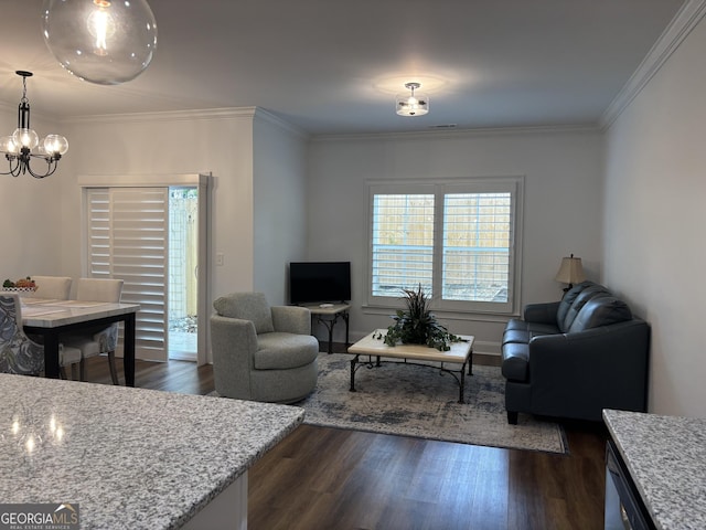 633 E 3rd St, Rome, GA 30161 - living area with dark wood finished floors, a chandelier, crown molding, and baseboards