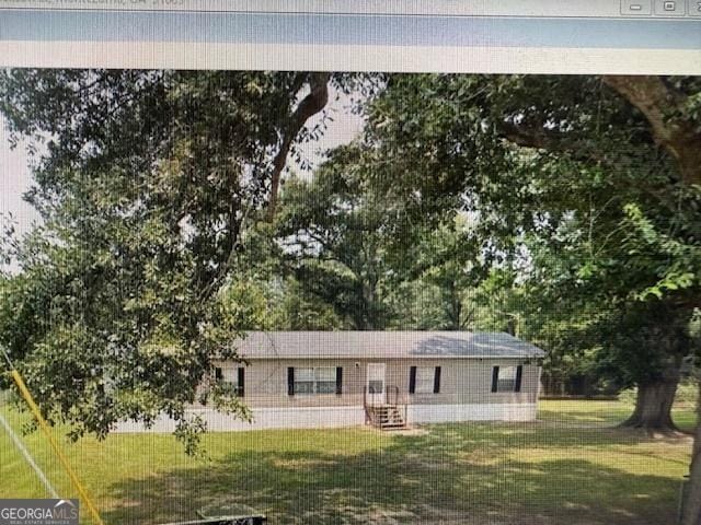 507 Jackson St, Montezuma, GA 31063 - view of front of house with a front lawn