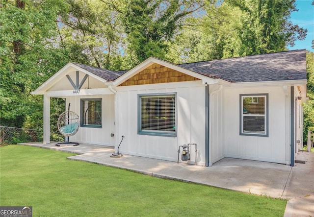 1497 Eason St NW, Atlanta, GA 30314 - back of house with a patio and a shingled roof