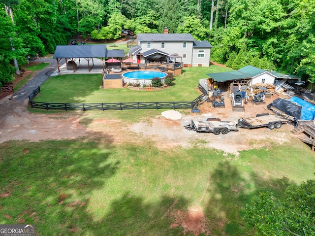 view from above of property featuring a forest
