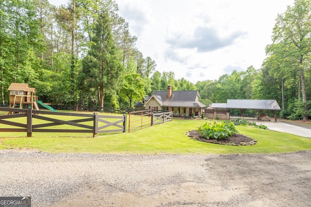 surrounding community featuring a detached carport